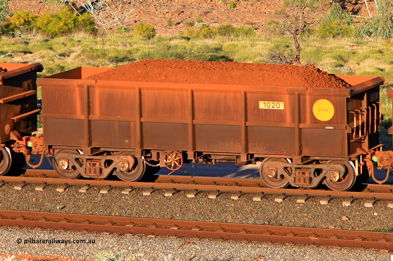 1020 110602 1646
Robe River ore waggon 1020, built by Bradken Rail Qld in January 2006, rotary coupler end handbrake side loaded view at the 71 km, Western Creek on the Deepdale line. June 2, 2011.
Keywords: 1020;Bradken-Rail-Qld;Robe-ore-waggon;
