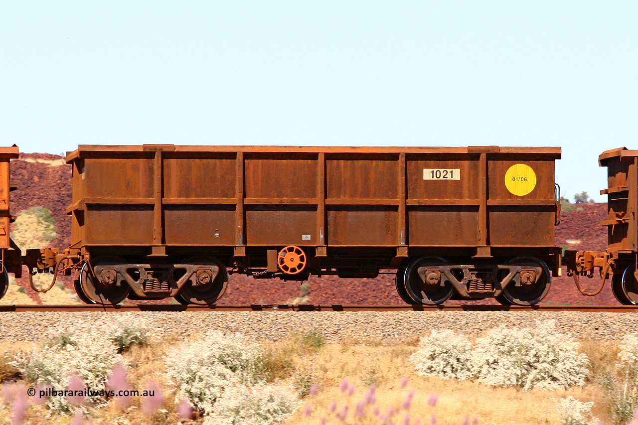 1021 060722 7435
Robe River ore waggon 1021, built by Bradken Rail Qld in January 2006, fixed coupler handbrake side empty view at the 45.4 km just south of Harding Siding on the Cape Lambert line. July 22, 2006.
Keywords: 1021;Bradken-Rail-Qld;Robe-ore-waggon;