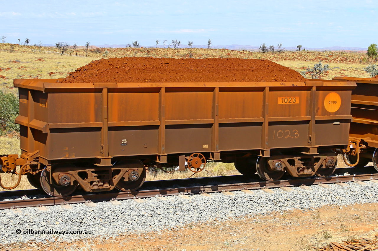 1023 170729 0236
Robe River ore waggon 1023, built by Bradken Rail Qld in January 2006, fixed coupler handbrake side loaded view at the 103 km, between Maitland Siding and the Fortescue River on the Deepdale line. July 29, 2017.
Keywords: 1023;Bradken-Rail-Qld;Robe-ore-waggon;