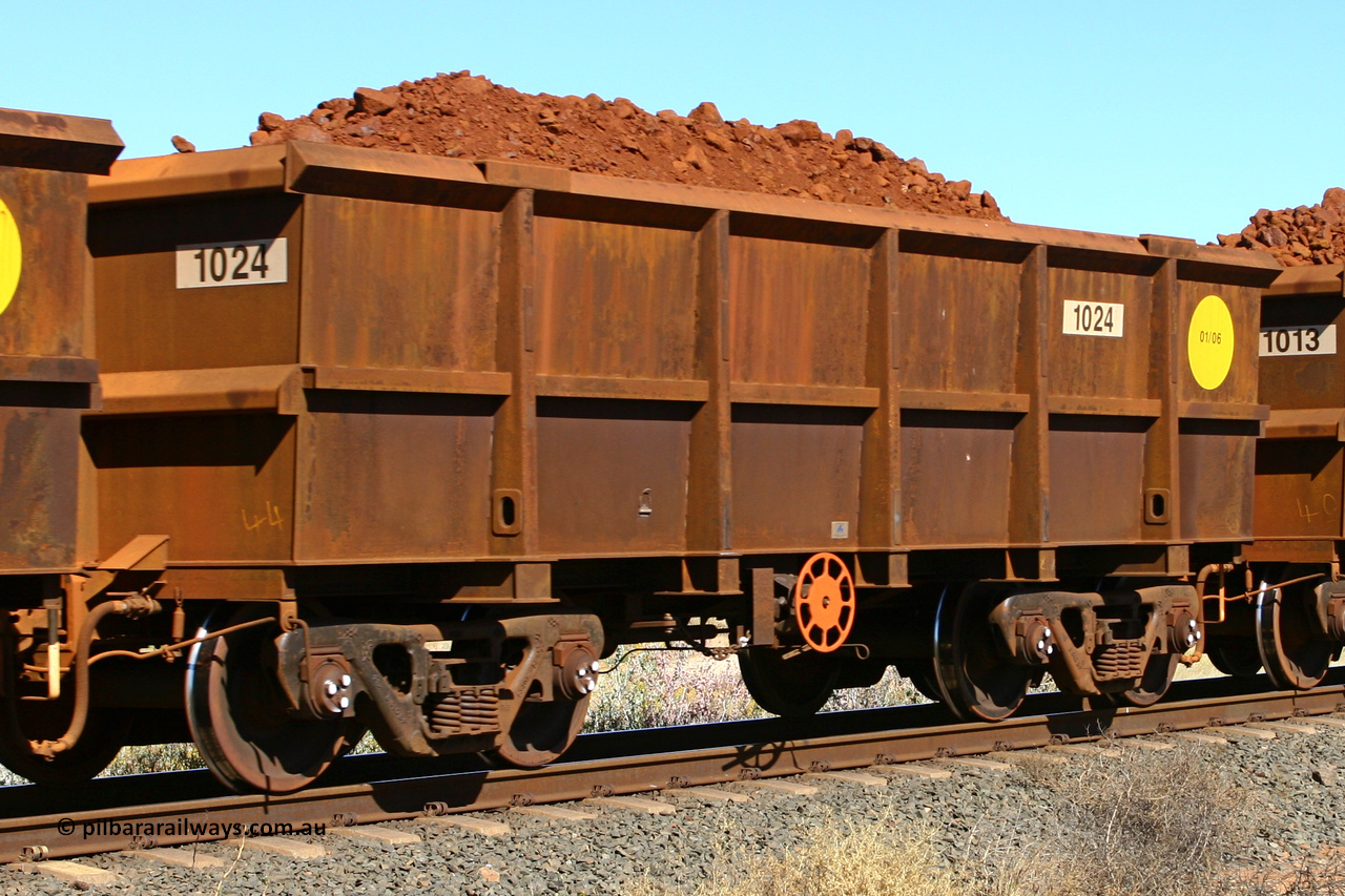 1024 060716 7195
Robe River ore waggon 1024, built by Bradken Rail Qld, January 2006, fixed coupler end handbrake side loaded view at the 71 km on the Deepdale line, Western Creek, July 16, 2006.
Keywords: 1024;Bradken-Rail-Qld;Robe-ore-waggon;