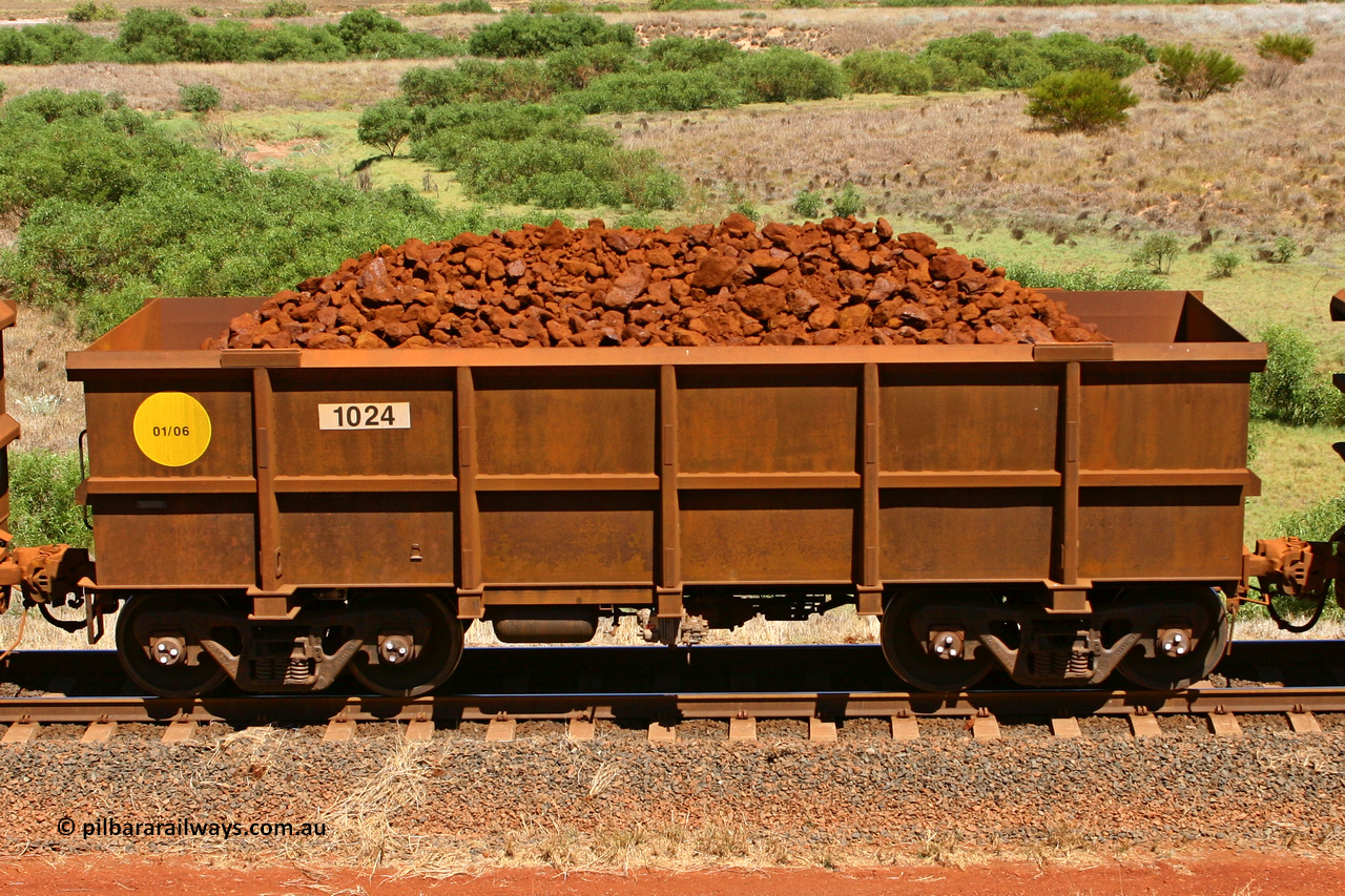 1024 061209 8191
Robe River ore waggon 1024, built by Bradken Rail Qld in January 2006, non-handbrake side loaded view at the 7 km location just south of Cape Lambert yard. December 9, 2006.
Keywords: 1024;Bradken-Rail-Qld;Robe-ore-waggon;