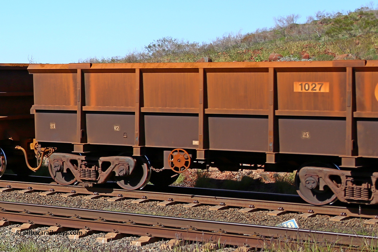 1027 160727 0960
Robe River ore waggon 1027, built by Bradken Rail Qld in January 2006, rotary coupler end handbrake side empty partial view at Harding Siding on the Cape Lambert line, July 27, 2016.
Keywords: 1027;Bradken-Rail-Qld;Robe-ore-waggon;