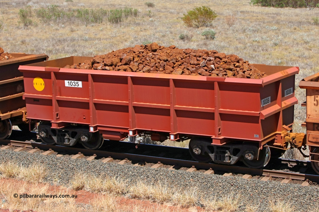 1035 081209 0165
Robe River ore waggon 1035, built by Bradken Rail Qld in September 2008, fixed coupler non-handbrake side loaded view at the 7 km location just south of Cape Lambert yard. December 9, 2008.
Keywords: 1035;Bradken-Rail-Qld;Robe-ore-waggon;