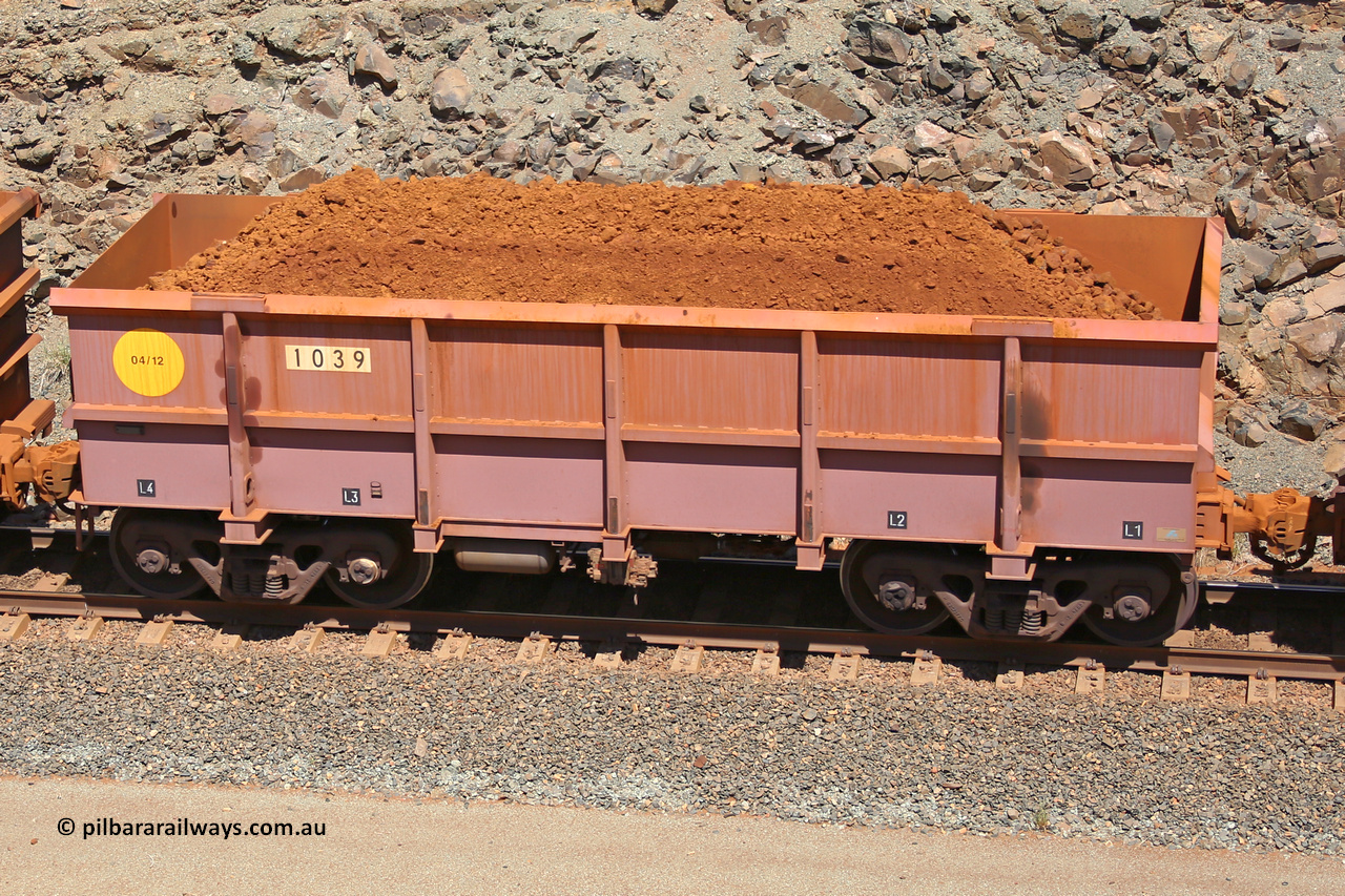 1039 160306 1593
Robe River ore waggon 1039, built by Bradken Rail Qld in April 2012, fixed coupler non-handbrake side loaded view, at the 45 km, Harding Siding on the Cape Lambert line. March 6, 2016.
Keywords: 1039;Bradken-Rail-Qld;Robe-ore-waggon;