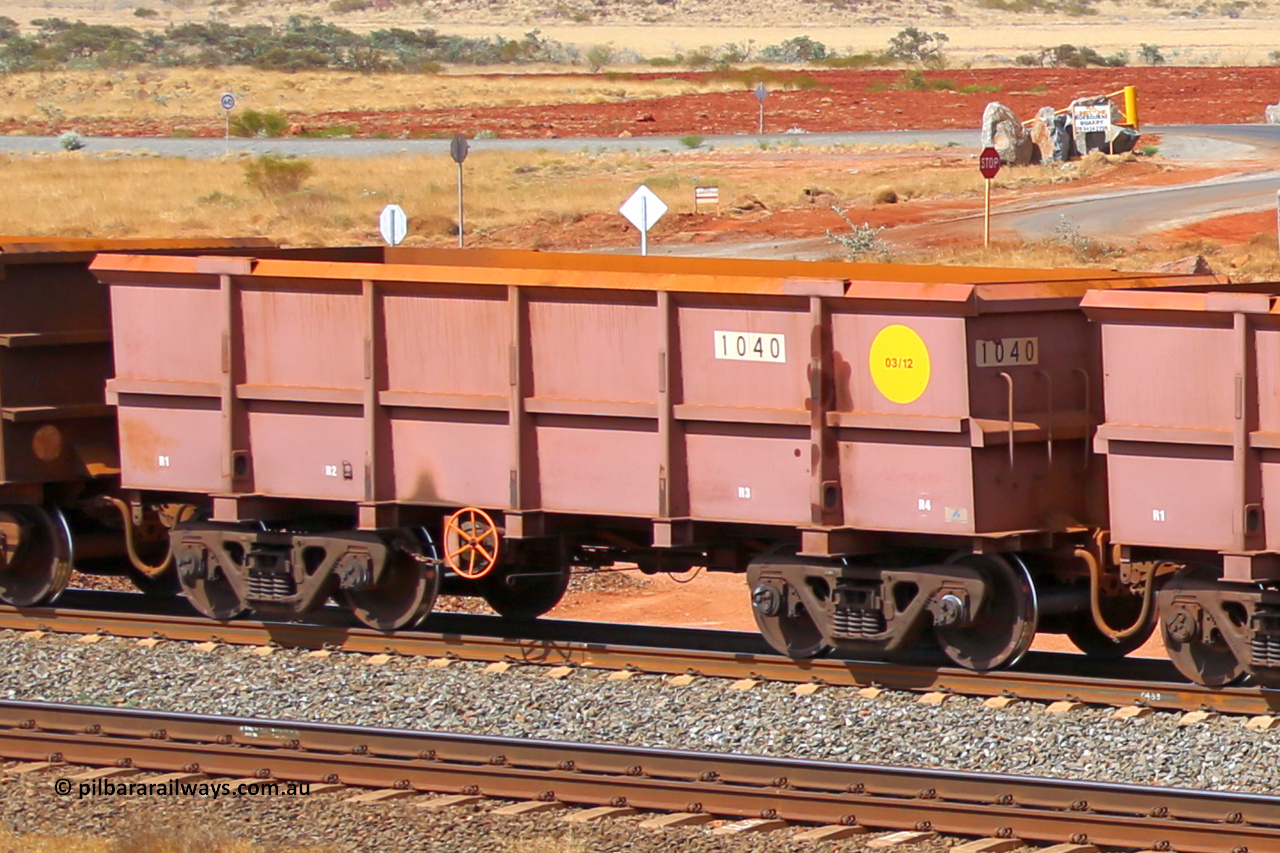 1040 141124 6811
Robe River ore waggon 1040, built by Bradken Rail Qld in March 2012, rotary coupler end handbrake side empty view at the 25 km at Arches Siding on the Cape Lambert line. November 24, 2014.
Keywords: 1040;Bradken-Rail-Qld;Robe-ore-waggon;