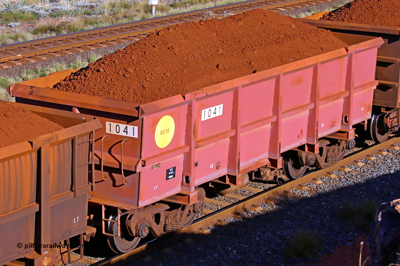 1041 210322 9700
Robe River ore waggon 1041, built by Bradken Rail Qld in March 2012, rotary coupler end non-handbrake side loaded view, at the 17 km on the Cape Lambert line, March 22, 2021.
Keywords: 1041;Bradken-Rail-Qld;Robe-ore-waggon;