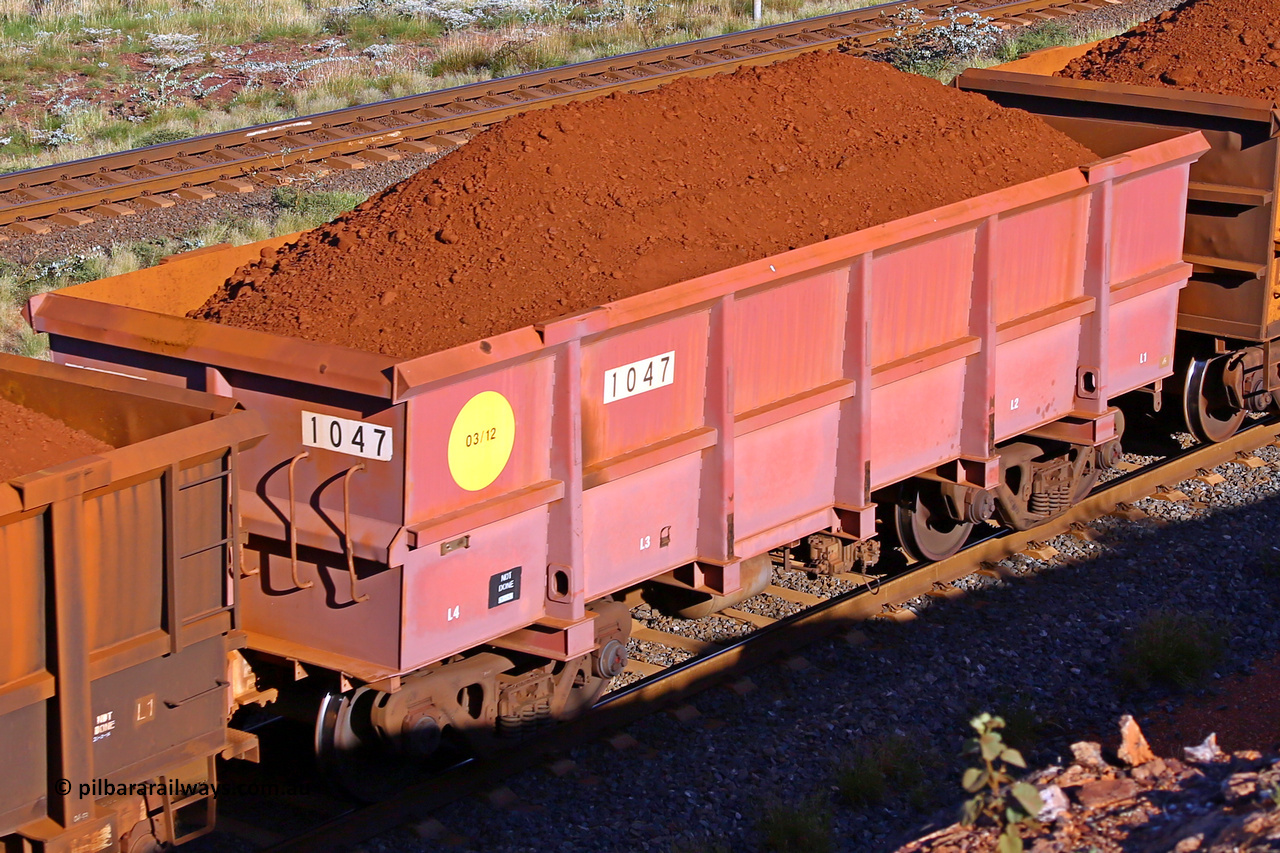 1047 210322 9682
Robe River ore waggon 1047, built by Bradken Rail Qld in March 2012, rotary coupler end non-handbrake side loaded view, at the 17 km on the Cape Lambert line, March 22, 2021.
Keywords: 1047;Bradken-Rail-Qld;Robe-ore-waggon;