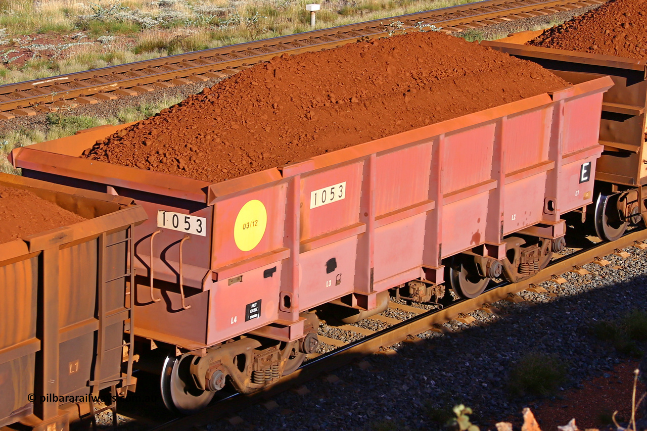 1053 210322 9719
Robe River ore waggon 1053, built by Bradken Rail Qld in March 2012, rotary coupler end non-handbrake side loaded view, at the 17 km on the Cape Lambert line, March 22, 2021.
Keywords: 1053;Bradken-Rail-Qld;Robe-ore-waggon;