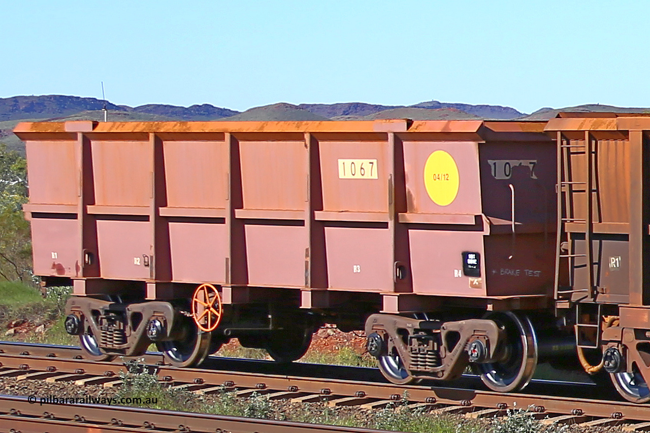 1067 160727 0990
Robe River ore waggon 1067, built by Bradken Rail Qld in April 2012, rotary coupler end handbrake side empty view at Harding Siding on the Cape Lambert line, July 27, 2016.
Keywords: 1067;Bradken-Rail-Qld;Robe-ore-waggon;