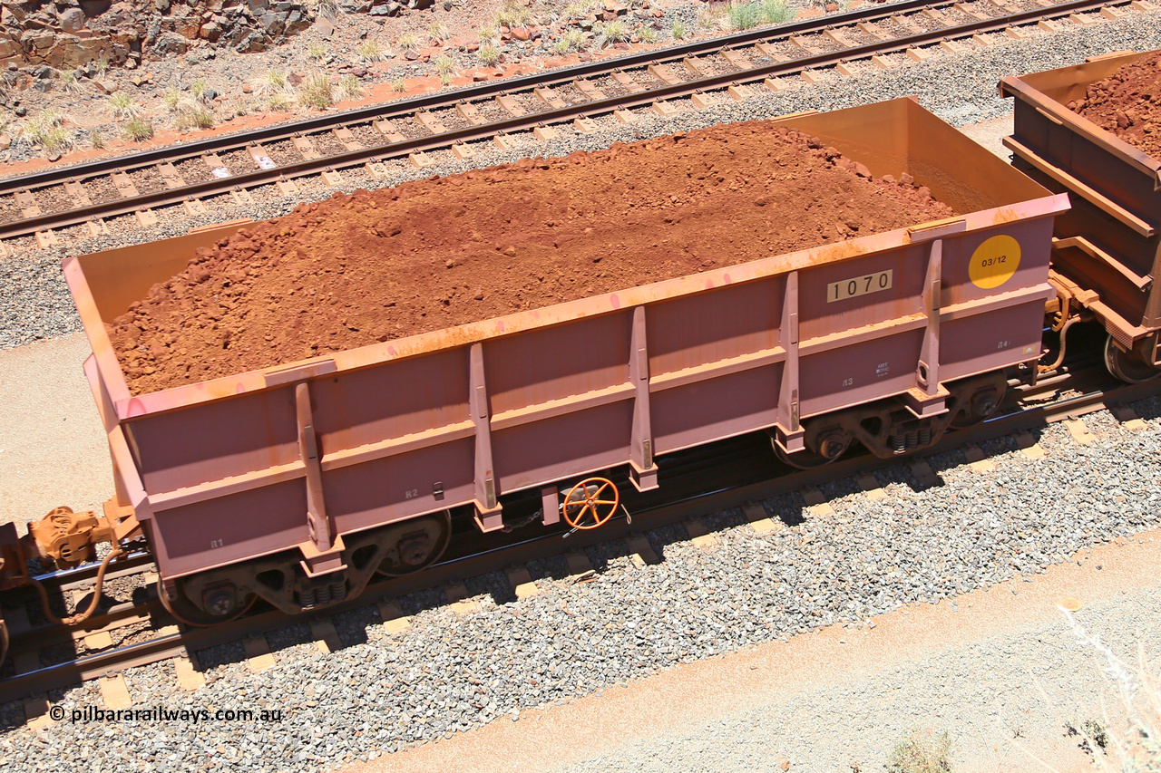 1070 160306 1465
Robe River ore waggon 1070, built by Bradken Rail Qld in March 2012, fixed coupler handbrake side loaded view, at the 45 km, Harding Siding on the Cape Lambert line. March 6, 2016.
Keywords: 1070;Bradken-Rail-Qld;Robe-ore-waggon;