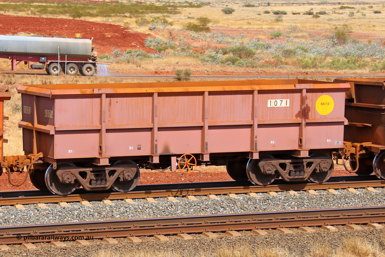 1071 141124 6822
Robe River ore waggon 1071, built by Bradken Rail Qld in April 2012, fixed coupler handbrake side empty view at the 25 km at Arches Siding on the Cape Lambert line. November 24, 2014.
Keywords: 1071;Bradken-Rail-Qld;Robe-ore-waggon;