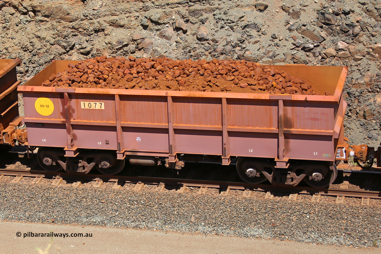 1077 160306 1660
Robe River ore waggon 1077, built by Bradken Rail Qld in May 2012, fixed coupler non-handbrake side loaded view, at the 45 km, Harding Siding on the Cape Lambert line. March 6, 2016.
Keywords: 1077;Bradken-Rail-Qld;Robe-ore-waggon;