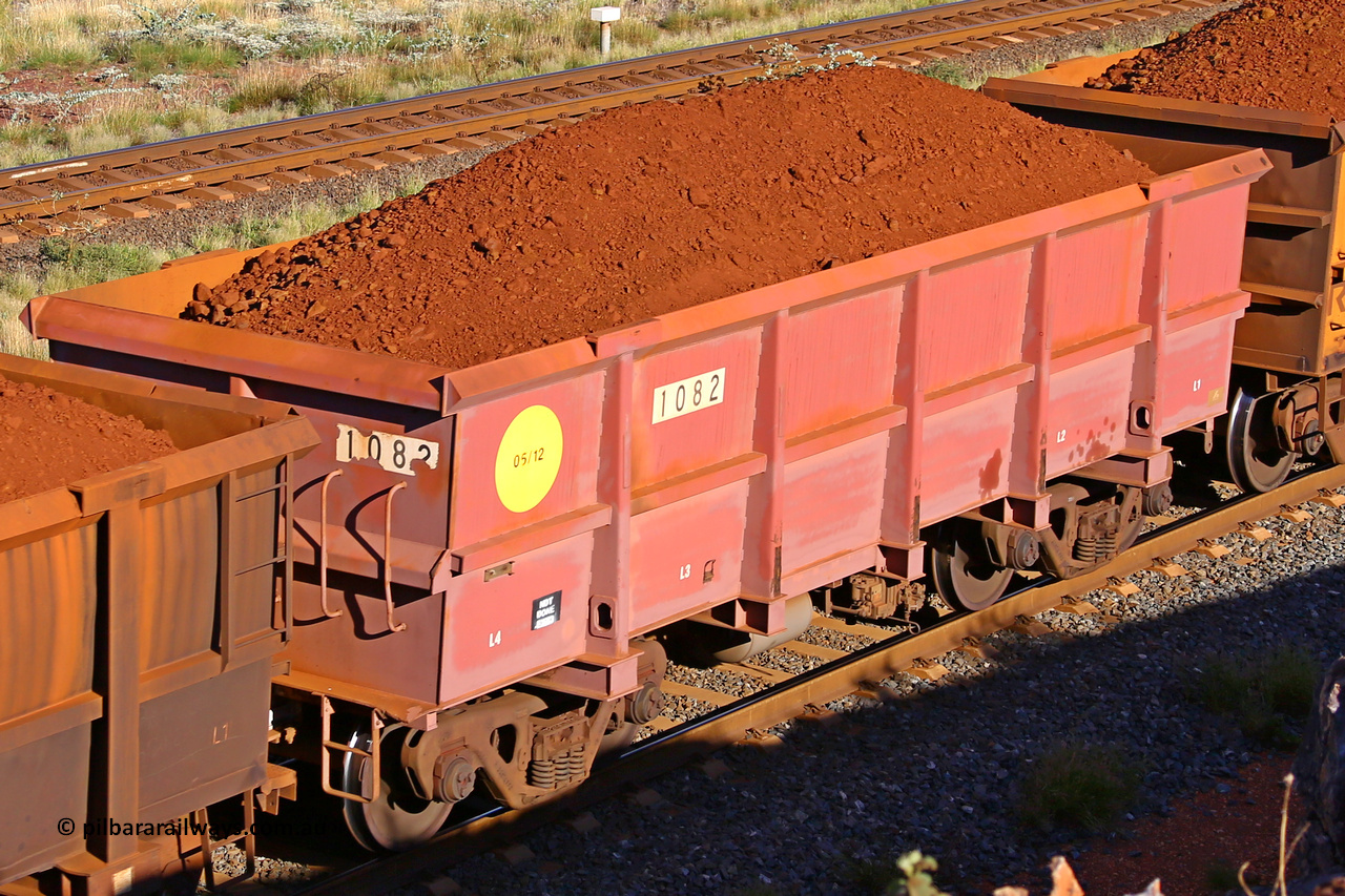 1082 210322 9727
Robe River ore waggon 1082, built by Bradken Rail Qld in May 2012, rotary coupler end non-handbrake side loaded view, at the 17 km on the Cape Lambert line, March 22, 2021.
Keywords: 1082;Bradken-Rail-Qld;Robe-ore-waggon;
