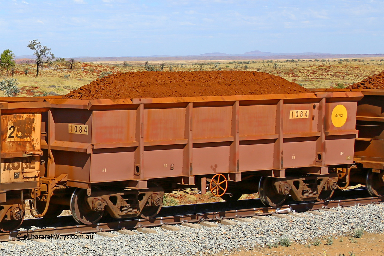 1084 170729 0267
Robe River ore waggon 1084, built by Bradken Rail Qld in April 2012, fixed coupler handbrake side loaded view at the 103 km, between Maitland Siding and the Fortescue River on the Deepdale line. July 29, 2017.
Keywords: 1084;Bradken-Rail-Qld;Robe-ore-waggon;