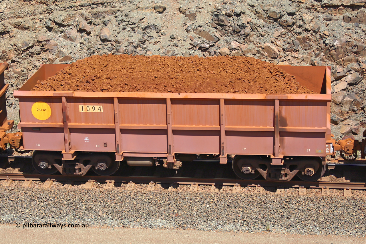 1094 160306 1524
Robe River ore waggon 1094, built by Bradken Rail Qld in April 2012, fixed coupler non-handbrake side loaded view, at the 45 km, Harding Siding on the Cape Lambert line. March 6, 2016.
Keywords: 1094;Bradken-Rail-Qld;Robe-ore-waggon;