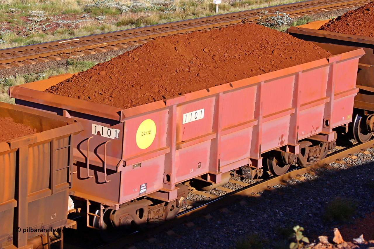1101 210322 9745
Robe River ore waggon 1101, built by Bradken Rail Qld in April 2012, rotary coupler end non-handbrake side loaded view, at the 17 km on the Cape Lambert line, March 22, 2021.
Keywords: 1101;Bradken-Rail-Qld;Robe-ore-waggon;