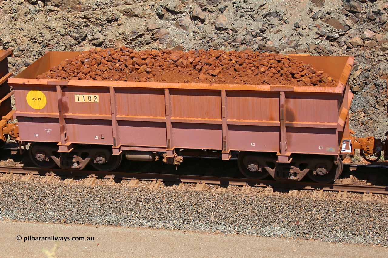1102 160306 1671
Robe River ore waggon 1102, built by Bradken Rail Qld in May 2012, fixed coupler non-handbrake side loaded view, at the 45 km, Harding Siding on the Cape Lambert line. March 6, 2016.
Keywords: 1102;Bradken-Rail-Qld;Robe-ore-waggon;