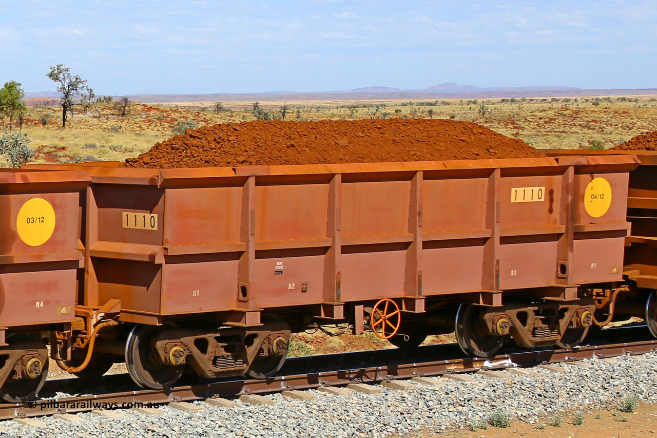 1110 170729 0261
Robe River ore waggon 1110, built by Bradken Rail Qld in April 2012, fixed coupler handbrake side loaded view at the 103 km, between Maitland Siding and the Fortescue River on the Deepdale line. July 29, 2017.
Keywords: 1110;Bradken-Rail-Qld;Robe-ore-waggon;