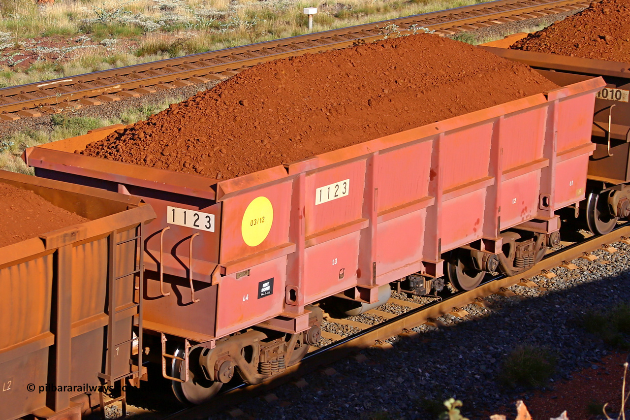 1123 210322 9705
Robe River ore waggon 1123, built by Bradken Rail Qld in March 2012, rotary coupler end non-handbrake side loaded view, at the 17 km on the Cape Lambert line, March 22, 2021.
Keywords: 1123;Bradken-Rail-Qld;Robe-ore-waggon;