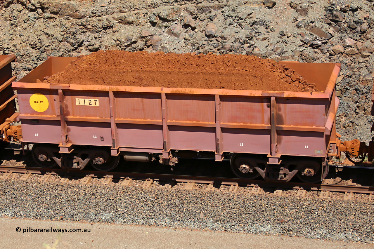 1127 160306 1630
Robe River ore waggon 1127, built by Bradken Rail Qld in March 2012, fixed coupler non-handbrake side loaded view, at the 45 km, Harding Siding on the Cape Lambert line. March 6, 2016.
Keywords: 1127;Bradken-Rail-Qld;Robe-ore-waggon;