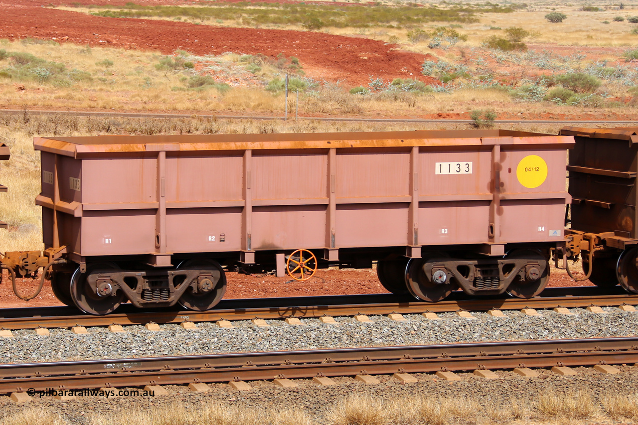 1133 141124 6863
Robe River ore waggon 1133, built by Bradken Rail Qld in April 2012, fixed coupler handbrake side empty view at the 25 km at Arches Siding on the Cape Lambert line. November 24, 2014.
Keywords: 1133;Bradken-Rail-Qld;Robe-ore-waggon;