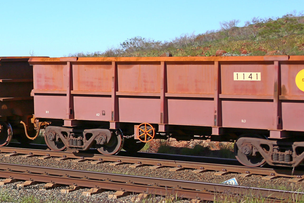1141 160727 0958
Robe River ore waggon 1141, built by Bradken Rail Qld in April 2012, rotary coupler end handbrake side empty partial view at Harding Siding on the Cape Lambert line, July 27, 2016.
Keywords: 1141;Bradken-Rail-Qld;Robe-ore-waggon;