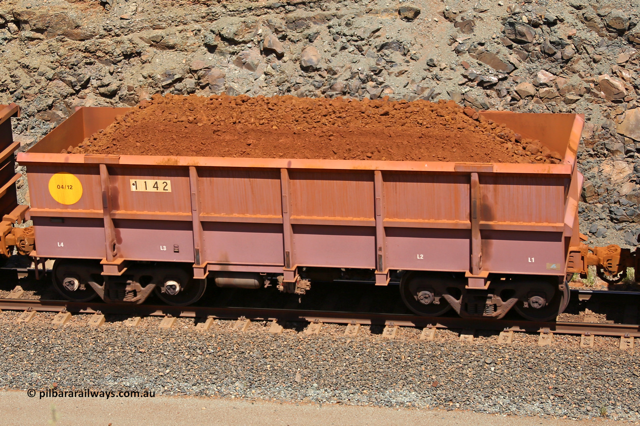1142 160306 1604
Robe River ore waggon 1142, built by Bradken Rail Qld in April 2012, fixed coupler non-handbrake side loaded view, at the 45 km, Harding Siding on the Cape Lambert line. March 6, 2016.
Keywords: 1142;Bradken-Rail-Qld;Robe-ore-waggon;