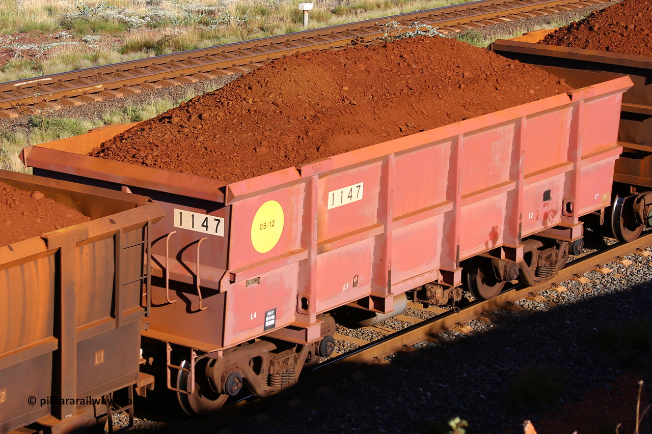 1147 210322 9739
Robe River ore waggon 1147, built by Bradken Rail Qld in May 2012, rotary coupler end non-handbrake side loaded view, at the 17 km on the Cape Lambert line, March 22, 2021
Keywords: 1147;Bradken-Rail-Qld;Robe-ore-waggon;