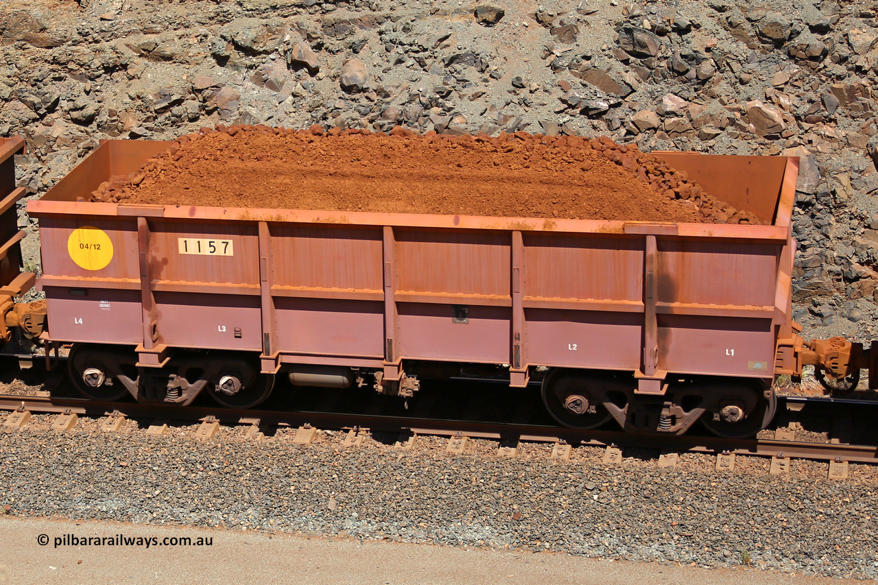 1157 160306 1613
Robe River ore waggon 1157, built by Bradken Rail Qld in April 2012, fixed coupler non-handbrake side loaded view, at the 45 km, Harding Siding on the Cape Lambert line. March 6, 2016.
Keywords: 1157;Bradken-Rail-Qld;Robe-ore-waggon;