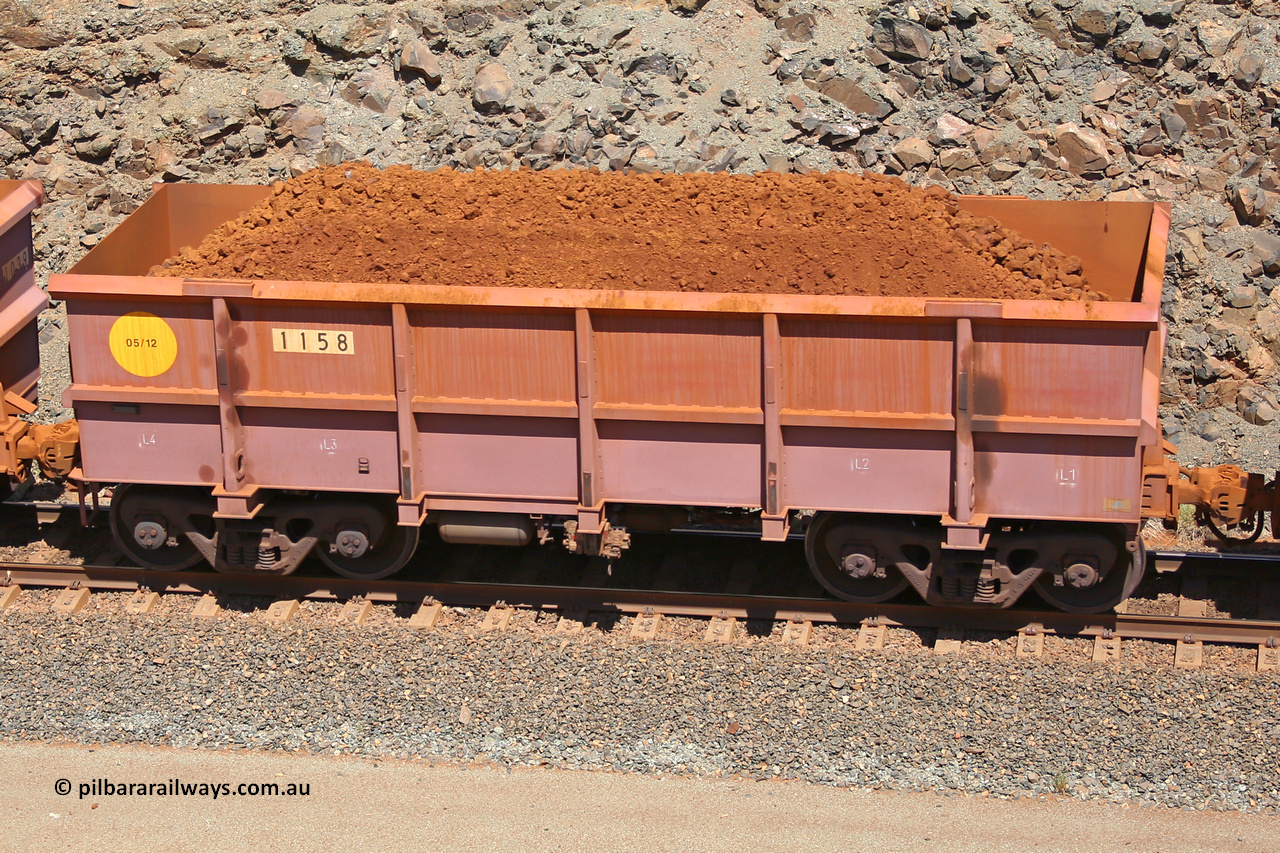 1158 160306 1594
Robe River ore waggon 1158, built by Bradken Rail Qld in May 2012, fixed coupler non-handbrake side loaded view, at the 45 km, Harding Siding on the Cape Lambert line. March 6, 2016.
Keywords: 1158;Bradken-Rail-Qld;Robe-ore-waggon;