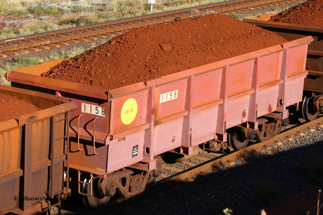1158 210322 9731
Robe River ore waggon 1158, built by Bradken Rail Qld in May 2012, rotary coupler end non-handbrake side loaded view, at the 17 km on the Cape Lambert line, March 22, 2021
Keywords: 1158;Bradken-Rail-Qld;Robe-ore-waggon;