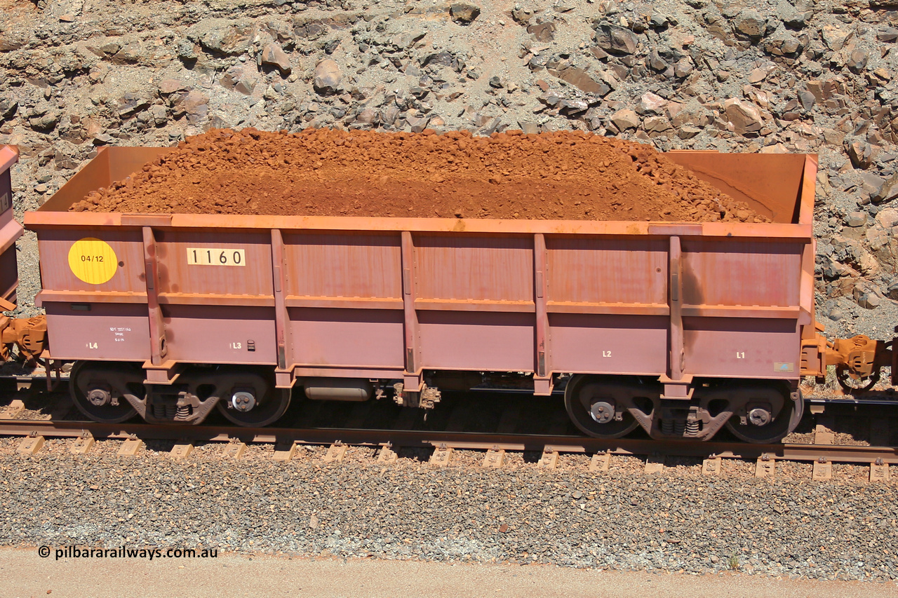 1160 160306 1569
Robe River ore waggon 1160, built by Bradken Rail Qld in April 2012, fixed coupler non-handbrake side loaded view, at the 45 km, Harding Siding on the Cape Lambert line. March 6, 2016.
Keywords: 1160;Bradken-Rail-Qld;Robe-ore-waggon;