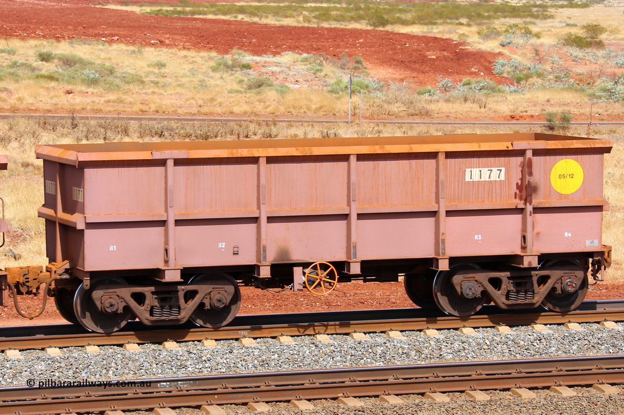 1177 141124 6872
Robe River ore waggon 1177, built by Bradken Rail Qld in May 2012, fixed coupler handbrake side empty end of train view at the 25 km at Arches Siding on the Cape Lambert line. November 24, 2014.
Keywords: 1177;Bradken-Rail-Qld;Robe-ore-waggon;