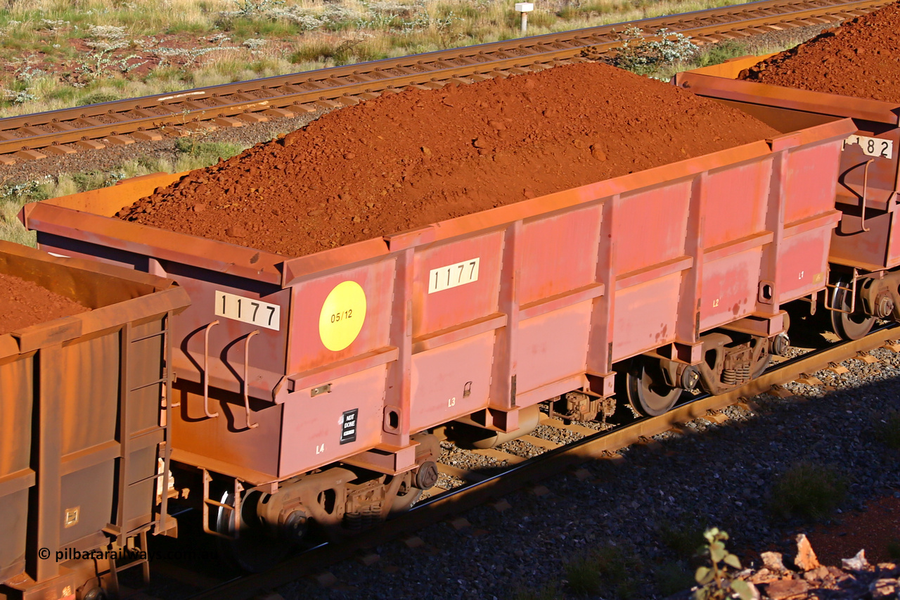 1177 210322 9761
Robe River ore waggon 1177, built by Bradken Rail Qld in May 2012, rotary coupler end non-handbrake side loaded view, at the 17 km on the Cape Lambert line, March 22, 2021
Keywords: 1177;Bradken-Rail-Qld;Robe-ore-waggon;