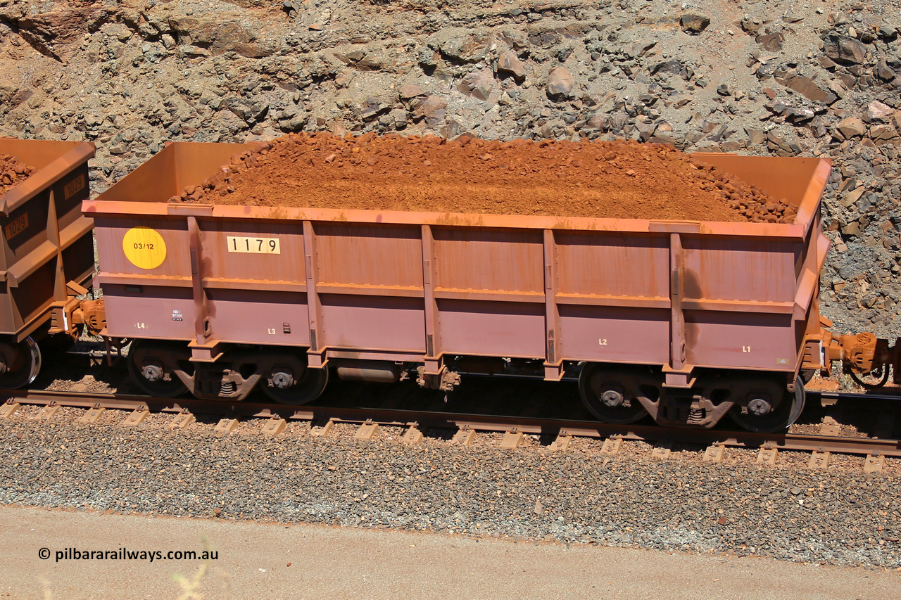 1179 160306 1642
Robe River ore waggon 1179, built by Bradken Rail Qld in March 2012, fixed coupler non-handbrake side loaded view, at the 45 km, Harding Siding on the Cape Lambert line. March 6, 2016.
Keywords: 1179;Bradken-Rail-Qld;Robe-ore-waggon;