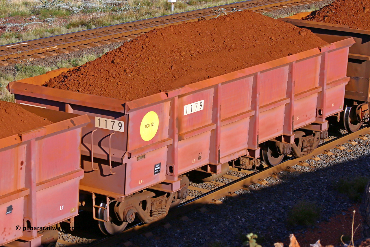 1179 210322 9698
Robe River ore waggon 1179, built by Bradken Rail Qld in March 2012, rotary coupler end non-handbrake side loaded view, at the 17 km on the Cape Lambert line, March 22, 2021
Keywords: 1179;Bradken-Rail-Qld;Robe-ore-waggon;