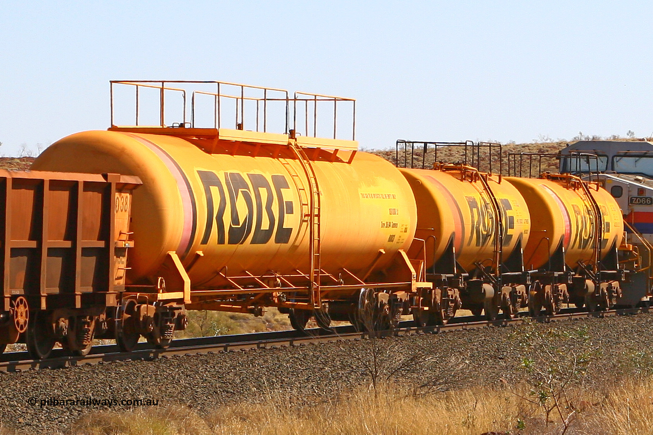 8003 070915 0885
Robe River diesel fuel tank waggons 8003, 8002 and 8001 running loaded at the front of an empty ore train. 8003 was built by Comeng NSW in March 1979 with a 100,000 litre capacity whilst 8002 and 8001 were built by the same builder with a 45,000 litre capacity in September 1972. At the 73.4 km on the Deepdale line, Western Creek, September 15, 2007.
Keywords: 8003;Comeng-NSW;Robe-tank-waggon;