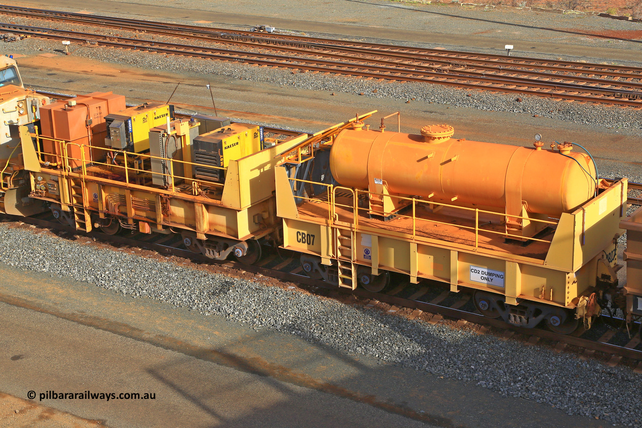 IC20-CB07 240619 0319
Robe River compressor waggon CB07 was originally IC 20 with air receiver and IC 21 with two Kaeser air compressors. These waggons were ballasted to 100 tonnes each and are modified ore waggons and used for CD2 DUMPING ONLY. Cape Lambert yard June 19, 2024.
Keywords: IC20;Robe-compressor-waggon;