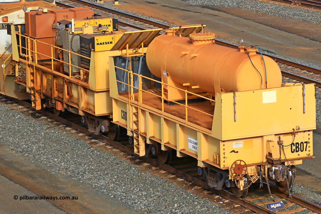 IC20-CB07 240619 0323
Robe River compressor waggon CB07 was originally IC 20 with air receiver and IC 21 with two Kaeser air compressors. These waggons were ballasted to 100 tonnes each and are modified ore waggons and used for CD2 DUMPING ONLY. Cape Lambert yard June 19, 2024.
Keywords: IC20;Robe-compressor-waggon;
