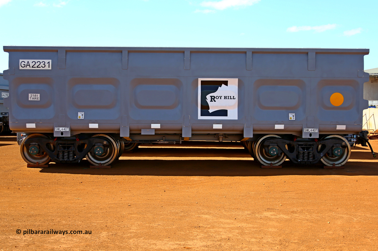 150314 7762
Wedgefield, following the delivery of Roy Hill's 1196 new GA type CCK138 model waggons, they were stored in several site whilst awaiting for enough track to be laid to allow delivery onto rail. GA2231 side view showing the logo and details, the yellow circle designates the rotary coupler end. March 14. 2015.
Keywords: GA-type;GA2231;CSR-Yangtze;CCK138