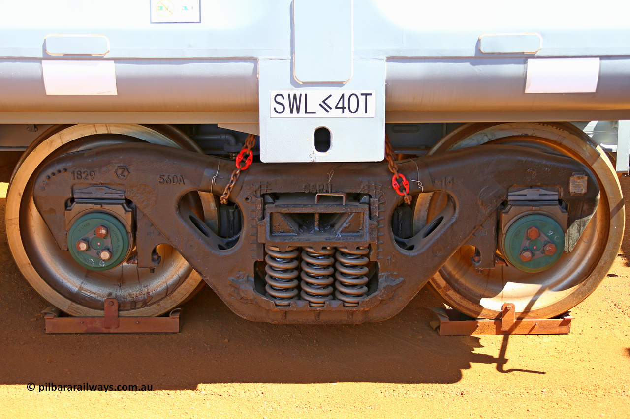 150314 7779
Wedgefield, following the delivery of Roy Hill's 1196 new GA type CCK138 model waggons, they were stored in several site whilst awaiting for enough track to be laid to allow delivery onto rail. GA2080 side view showing the SSRM bogie. March 14. 2015.
Keywords: GA-type;GA2080;CSR-Yangtze;CCK138