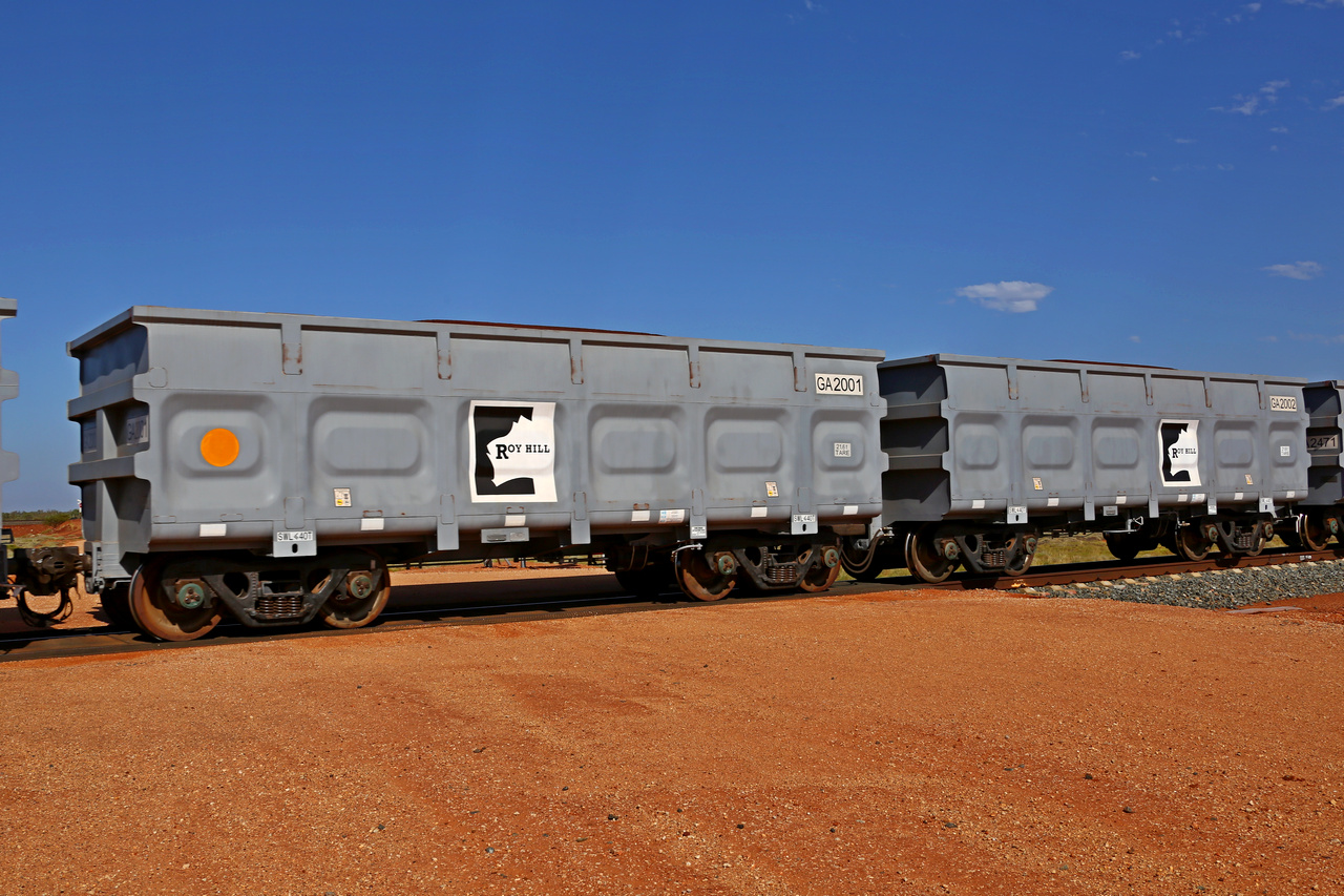 151203 9598
At the 47.442 km grade crossing on the Roy Hill line, adjacent to FMG's Barker ballast siding, loaded Roy Hill waggon pair GA type class leaders GA 2001 - GA 2002. Built in China by CSR Yangtze as an CCK138 model ore waggon. December 3, 2015.
Keywords: GA-type;GA2001-GA2002;CSR-Yangtze;CCK138