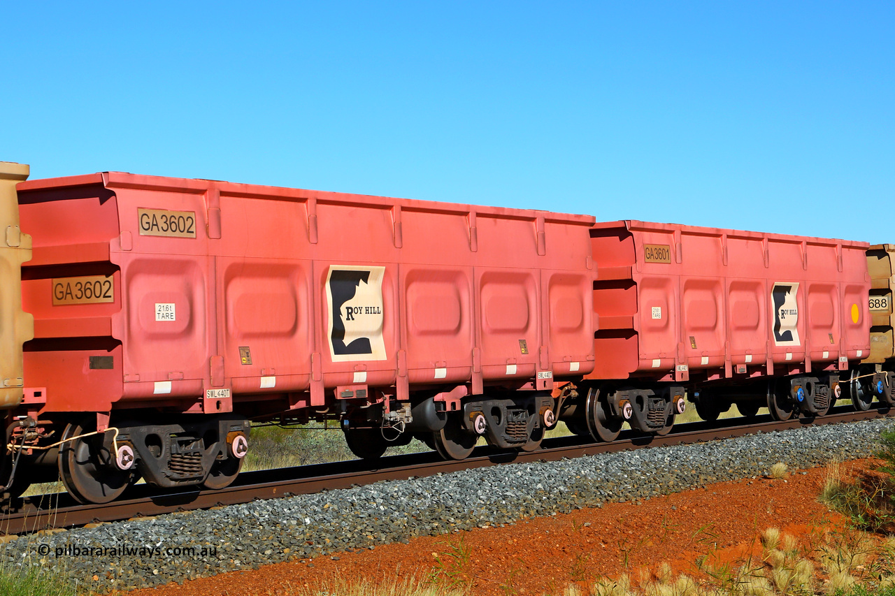 250501 0434
At the 88.448 km, just south of HPPL crossing loop on the Roy Hill line, empty Roy Hill waggon pair GA 3601 - GA 3602, built in China by CRRC Yangtze as an CCK138 model ore waggon in Breast Cancer Awareness pink livery. May 1, 2025.
Keywords: GA-type;GA3601-GA3602;CRRC-Yangtze;CCK138;