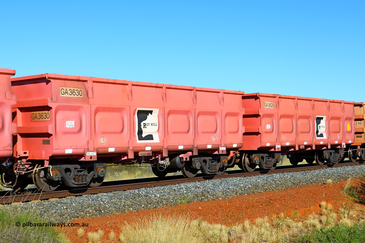 250501 0446
At the 88.448 km, just south of HPPL crossing loop on the Roy Hill line, empty Roy Hill waggon pair GA 3629 - GA 3630, built in China by CRRC Yangtze as an CCK138 model ore waggon in Breast Cancer Awareness pink livery. May 1, 2025.
Keywords: GA-type;GA3629-GA3630;CRRC-Yangtze;CCK138;
