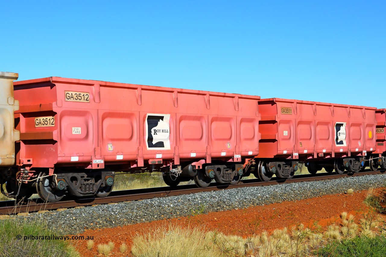 250501 0447
At the 88.448 km, just south of HPPL crossing loop on the Roy Hill line, empty Roy Hill waggon pair GA 3511 - GA 3512, built in China by CRRC Yangtze as an CCK138 model ore waggon in Breast Cancer Awareness pink livery. May 1, 2025.
Keywords: GA-type;GA3511-GA3512;CRRC-Yangtze;CCK138;