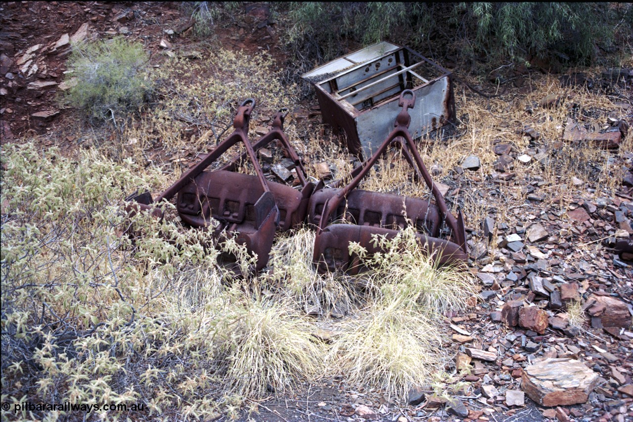 194-03
Wittenoom Gorge, Colonial Mine, asbestos mining remains, pile of four scoop buckets.
