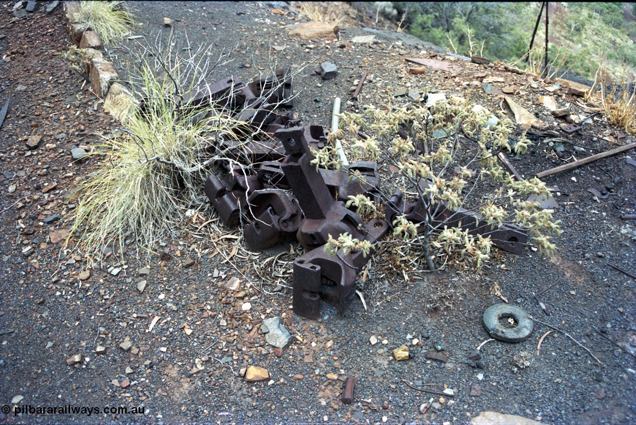 194-04
Wittenoom Gorge, Colonial Mine, pile of knuckle couplers for railway waggons.
