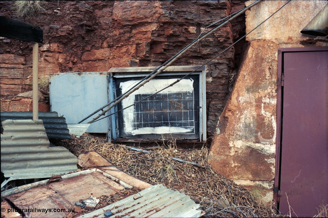 194-09
Wittenoom Gorge, Colonial Mine, asbestos mining remains, safety statistics board at mine adit, a view of it in operating condition can be found here [url=http://purl.slwa.wa.gov.au/slwa_b4232624_9]SLWA b4232624 9[/url].

