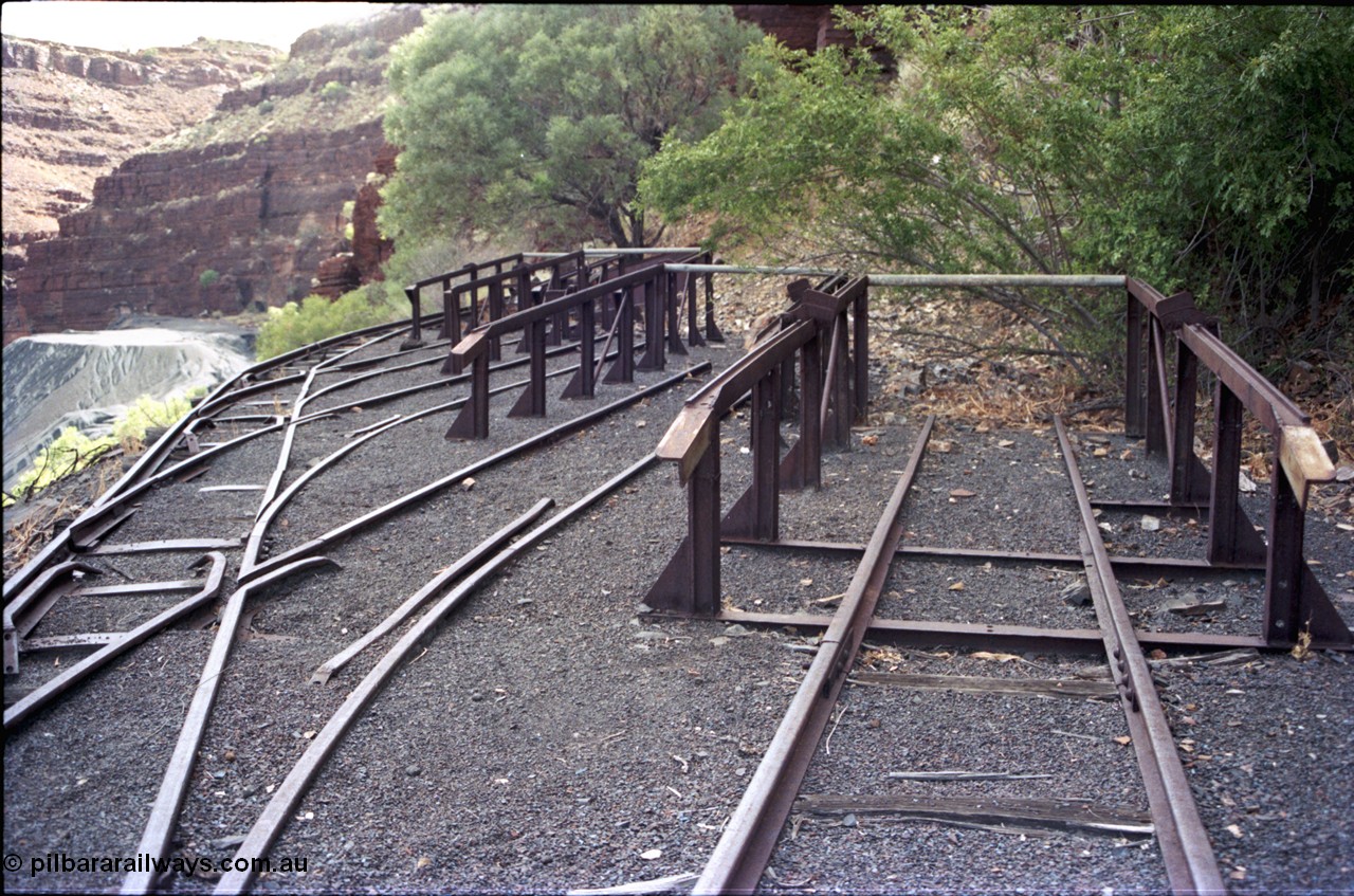 194-15
Wittenoom, Colonial Mine, asbestos mining remains, railway workshops with loco storage roads, the raised ramps are for removing the battery modules off the locomotives.
