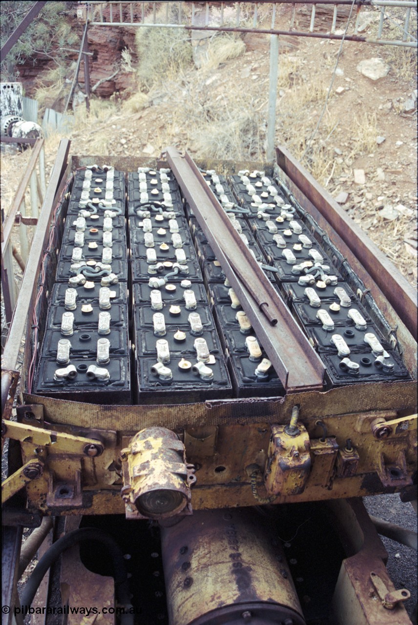 194-22
Wittenoom, Colonial Mine, asbestos mining remains, detail view of a Mancha battery module with the covers in the open position shows the full forty eight 2 volt cells to power the 80 volt locomotives.
